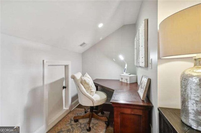 office area featuring lofted ceiling