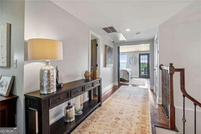 hallway featuring hardwood / wood-style floors