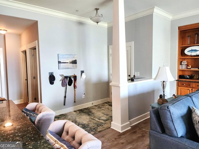 living room featuring ornamental molding and dark wood-type flooring