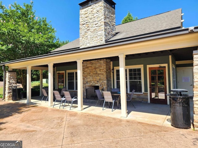 rear view of house with a patio