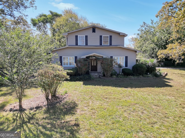 front facade with a front lawn