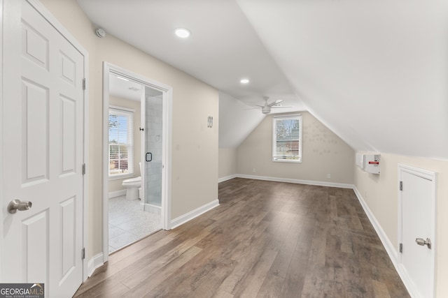 unfurnished bedroom featuring ceiling fan and dark hardwood / wood-style floors