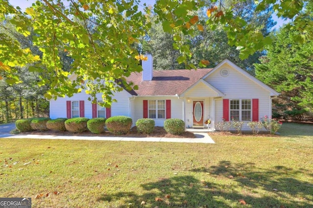 view of front facade with a front yard