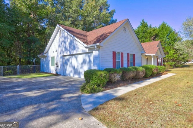 view of home's exterior with a yard