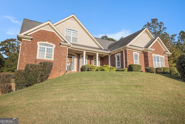 view of front of home featuring a front yard