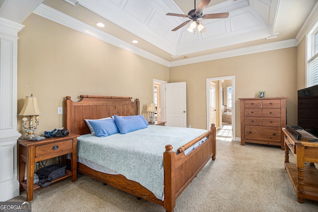 carpeted bedroom featuring connected bathroom, ornamental molding, decorative columns, and ceiling fan