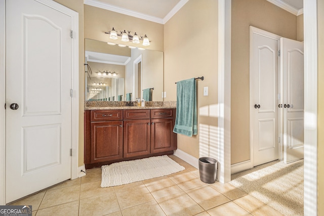 bathroom featuring vanity, ornamental molding, and tile patterned floors