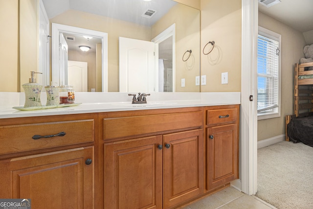 bathroom with vanity and tile patterned floors