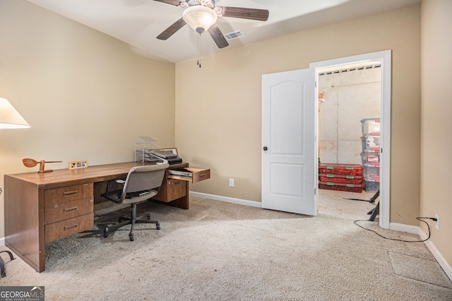 office with light carpet and ceiling fan