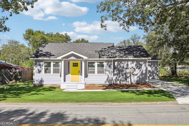 view of front of home with a front lawn