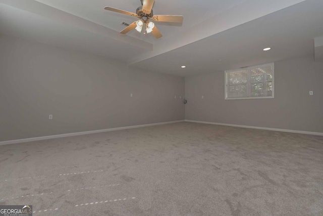 empty room featuring carpet flooring and ceiling fan