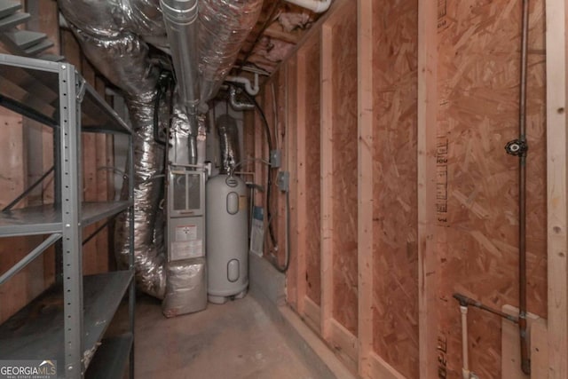 utility room featuring electric water heater