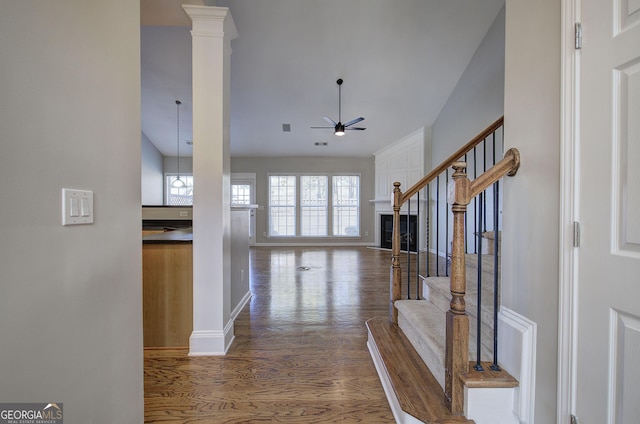 corridor with hardwood / wood-style floors