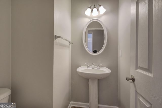 bathroom featuring toilet