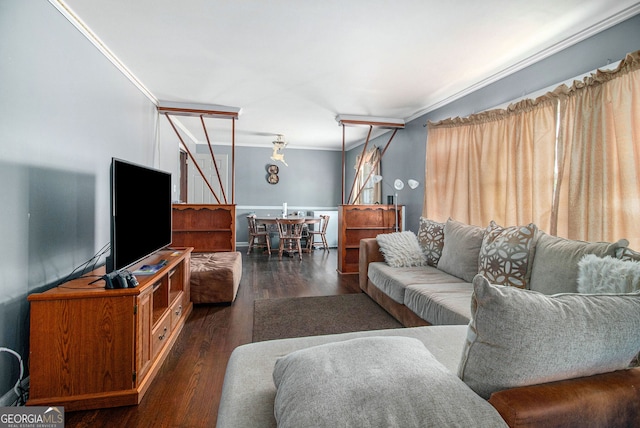 living room featuring ornamental molding and dark wood-type flooring