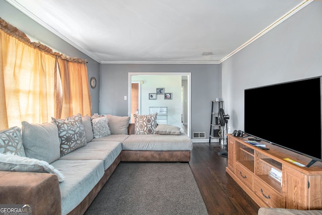 living room with dark wood-type flooring and ornamental molding