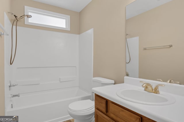 full bathroom featuring vanity, toilet, and  shower combination