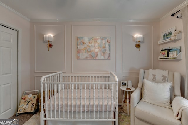 bedroom with crown molding and a crib