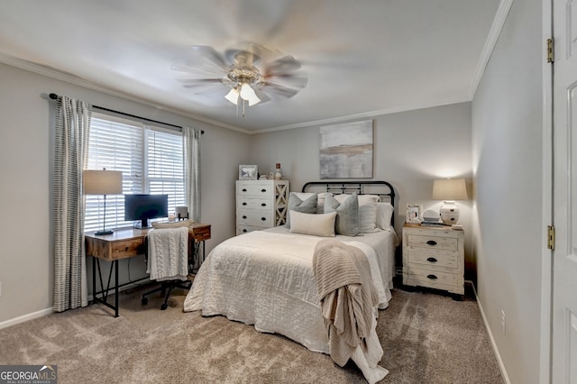 bedroom featuring ceiling fan, ornamental molding, and carpet floors