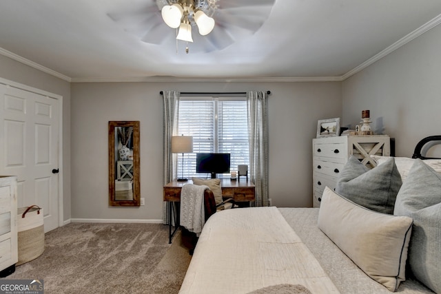 carpeted bedroom with crown molding and ceiling fan