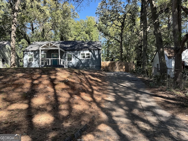 1901 Maywood Pl NW, Atlanta, GA 30318 - view of front of home featuring fence and asphalt driveway
