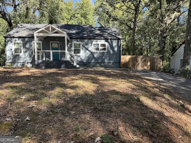 1901 Maywood Pl NW, Atlanta, GA 30318 - view of front of property featuring covered porch, fence, crawl space, and roof with shingles