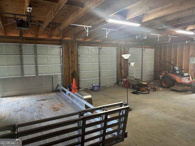 garage featuring a garage door opener