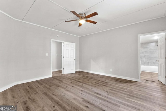 interior space featuring hardwood / wood-style flooring and ceiling fan