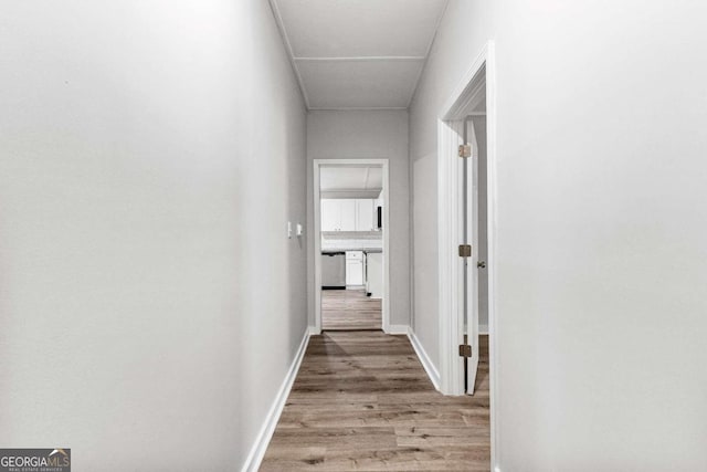 100 International St, Hogansville, GA 30230 - corridor with wood finished floors and baseboards