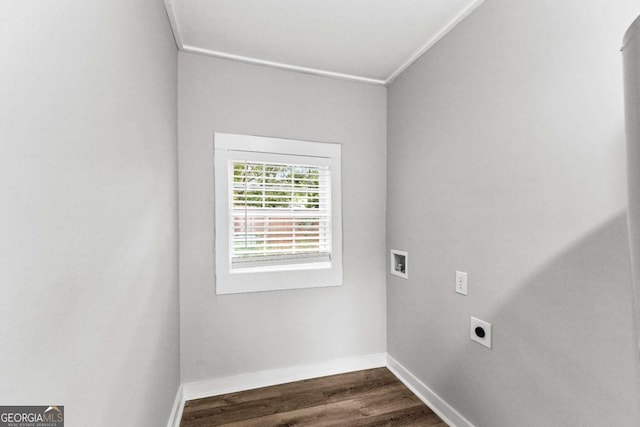 washroom with hookup for an electric dryer, ornamental molding, dark wood-type flooring, and hookup for a washing machine