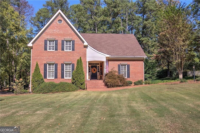 view of front of home with a front lawn