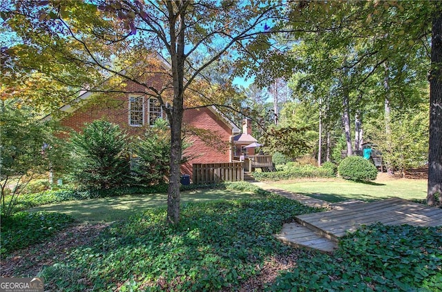 view of yard featuring a deck