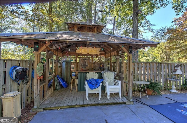 exterior space featuring a gazebo and a wooden deck