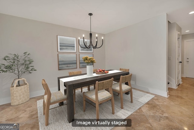 dining space featuring a notable chandelier