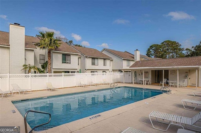 view of swimming pool featuring a patio