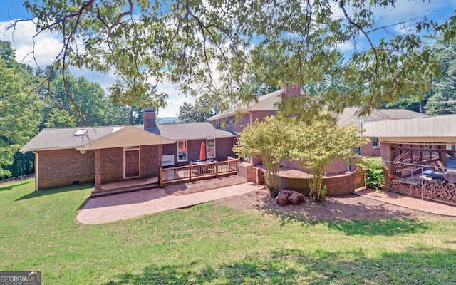 view of yard featuring a deck