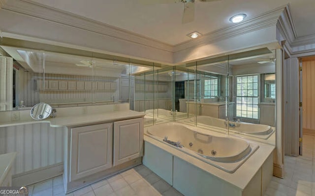 bathroom with ornamental molding, a bath, and ceiling fan