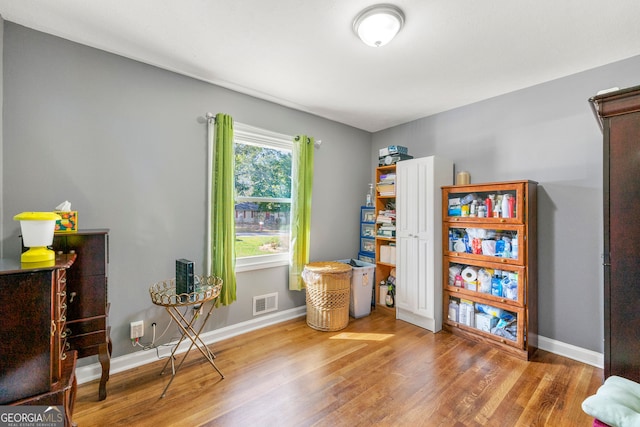 misc room with hardwood / wood-style flooring