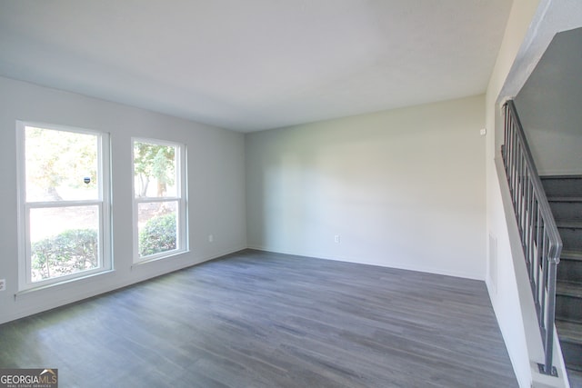 empty room featuring dark hardwood / wood-style floors