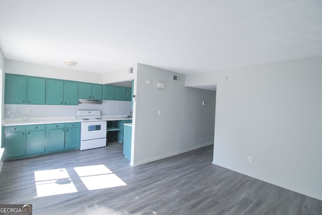 kitchen with decorative backsplash, dark hardwood / wood-style floors, and electric stove