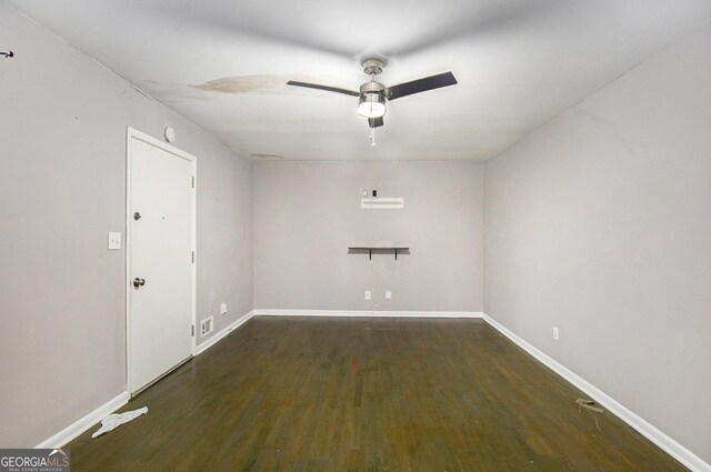 2210 Rhinehill Rd SE, Atlanta, GA 30315 - spare room featuring ceiling fan, wood finished floors, and baseboards