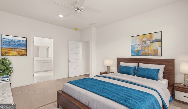 carpeted bedroom featuring ensuite bath and ceiling fan