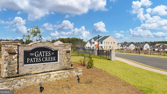 view of community sign