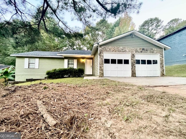 single story home with a garage