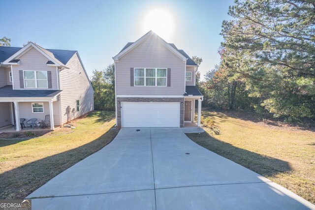 view of front of house featuring cooling unit, a front lawn, and a garage