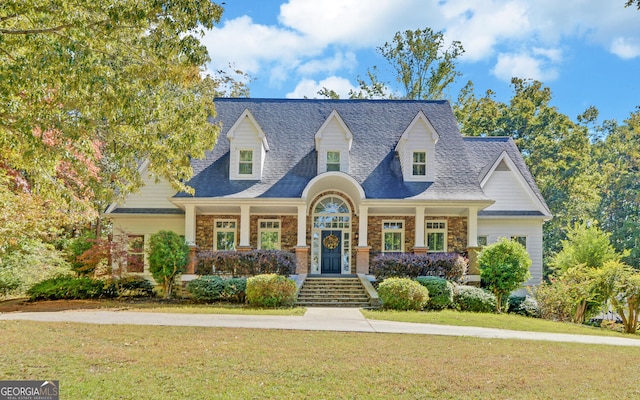 715 Cross Creek Dr, Toccoa, GA 30577 - view of front of property with a front lawn, covered porch, roof with shingles, and brick siding