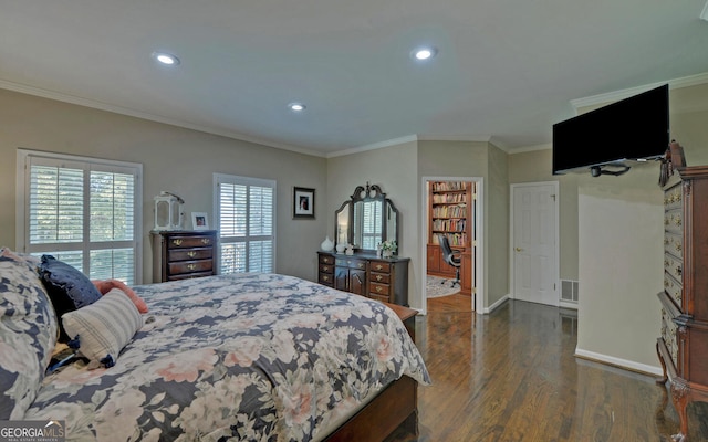 bedroom featuring ornamental molding and dark hardwood / wood-style floors