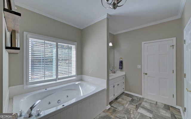 bathroom with vanity, crown molding, and tiled tub