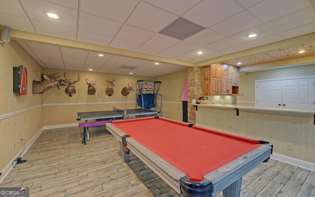 rec room featuring a drop ceiling, pool table, and light wood-type flooring