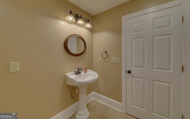 715 Cross Creek Dr, Toccoa, GA 30577 - bathroom featuring baseboards, tile patterned floors, and a sink